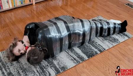 Cara and Minx - Face to Face Mummified Pair Gagging on Double Ball Gag! (WMV Format)