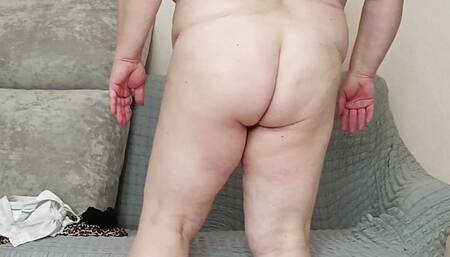 Stepmom with big tits caresses herself in front of the camera