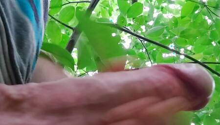 Hard handjob in the forest. Throbbing and lots of cum