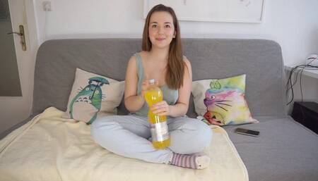 Drinking A Large Bottle of Soda and Trying To Burp