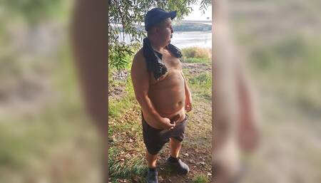 Bear Masturbating on the river bank