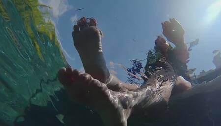 “You can come up for air after you worship my feet!” Raven Lynette pushes you in the pool