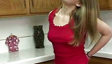 Little April rubbing andfingering pussy on kitchen