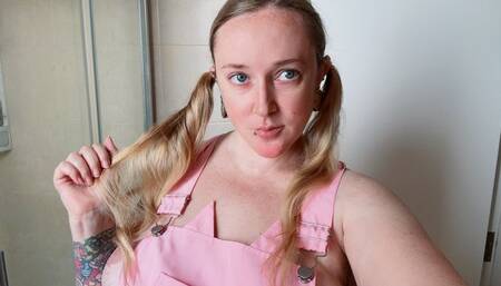 Brushing my long blond hair and make pigtails