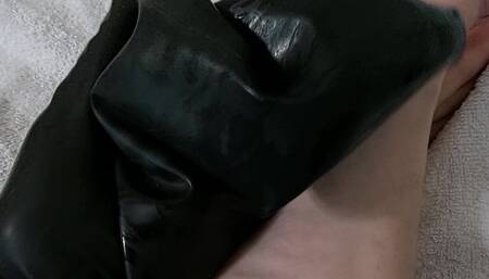 Taking off sweaty latex socks