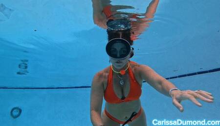 Orange suit with tank banger gag in the public pool