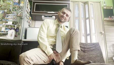 suited gentleman is spreading legs like slut and plays with his malepussy with locked dick