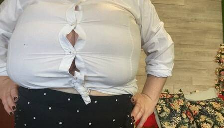 A very tight shirt is about to be ripped