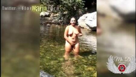 Masturbating in the river, outdoors in a public place