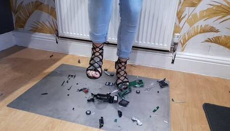 Giantess Atari queen destroys a 1969 Camaro hand built toy car crush in sexy black strappy heels right side view