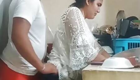 Maid Fucked When She Washes the Dishes in the Kitchen