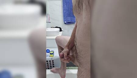 Milking my thick cock in the shower.