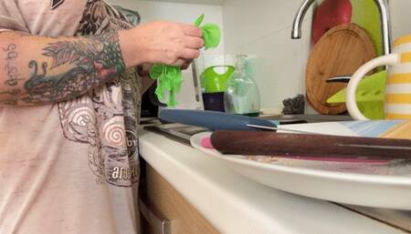 Dishwashing In Green Latex Gloves