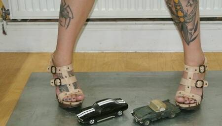 Giantess Atari Queen slow toy car crush a Camaro & Corvette in wooden high heels right view