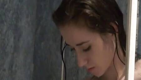 Cute teen masturbates in the hot shower scene
