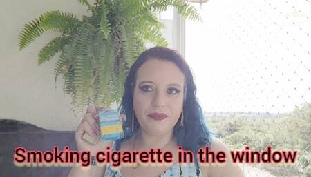 Smoking cigarette in the window - SGL058