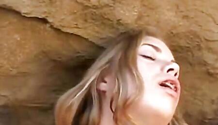 Hot teen fingers herself in outdoor scene