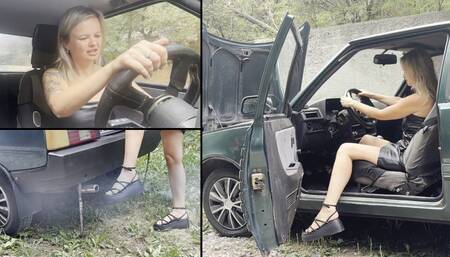 Anastasia trying to start ZAZ, revving and playing with exhaust fumes