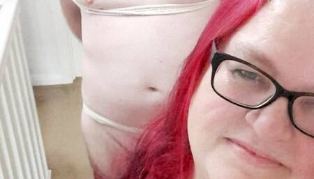 Miss M with a completely helpless man tied to ladder