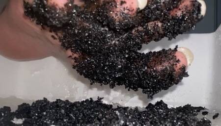 Bare toes in sticky tar