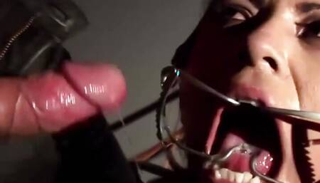 Restrained babe sucks her master's big and hard cock