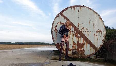 Crossdresser Playing Down on the Farm in PVC