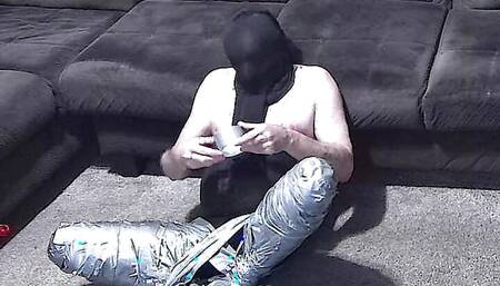 Self bondage in duct tape and pantyhose