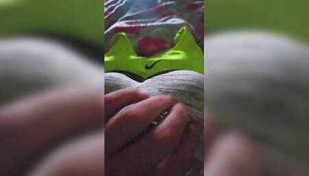 Using my step sis bra to help me cum in her green nike pro sports bra