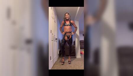 Orlandi480 sexy crossdresser in faux leather outfit posing and riding Mr. Hankeys plumber dildo