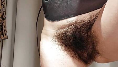 Sexy brunette with pussy tries on clothes. Hairy pussy, big hairy tits, big nipples.