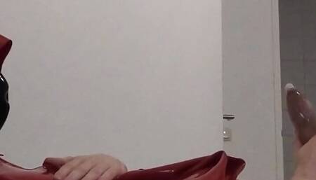 Condom cum in red latex hooded swing dress and face mask masturbation