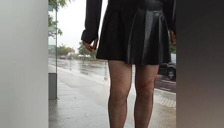 crossdresser outside at the bus stop with sex in her chastity cage and plugged ass