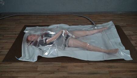 Schoolgirl in a large vacuum bag with vibro