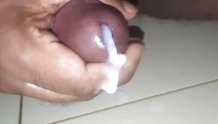 Guy with a tickle pinky cock head Jerk off harder sitting in the bathroom until cum.