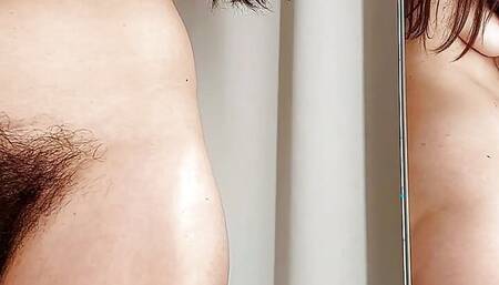 Sexy brunette with pussy tries on clothes. Hairy pussy, big hairy tits, big nipples.