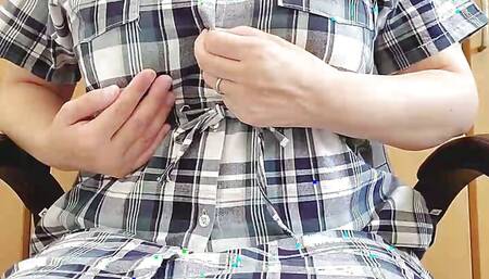 A married woman masturbating obscenely on a chair