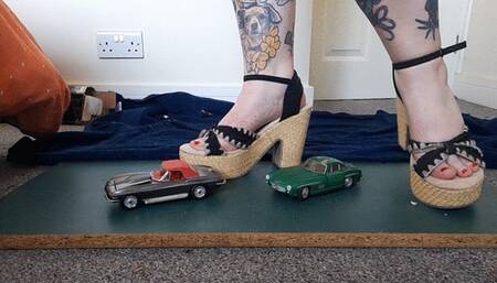 Giantess Jayne crushes a Mercedes and corvette in chunky heels toy car crush low closeup ground view