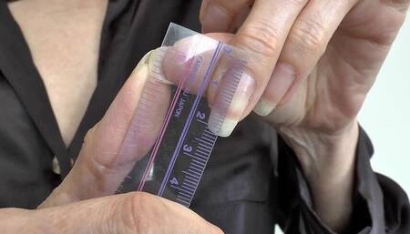 Measuring Fingernails on Beautiful Hands