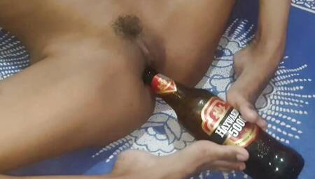 Desi petite hot babe masturbating and fucking with beer bottle