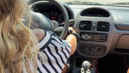 Lou takes the weel and drives in white sandals