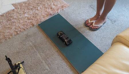 Back by popular demand GIANTESS Charn crushes a Pontiac Trans-am in Flipflops high right view