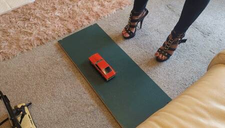 GIANTESS Charn crushes a 1969 Ford Torino in black stiletto high heels high right view