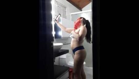 I record my wife in the bathroom while she is getting ready to go out