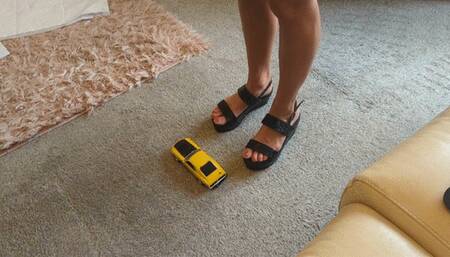 GIANTESS Charn crushes a yellow Ford Boss Mustang in black wedges extra high right view