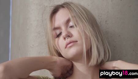 Passionate blondie reveals her huge tits