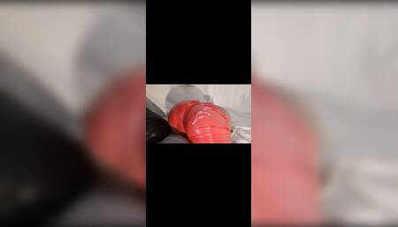 Cumming on her big shiny red leather ass