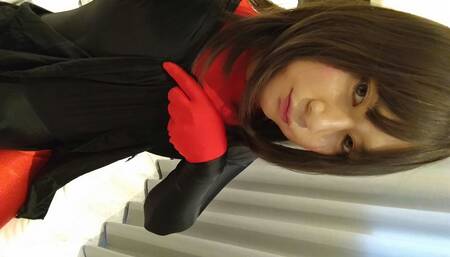 A cross-dressing boy changes into red full-body tights and masturbates
