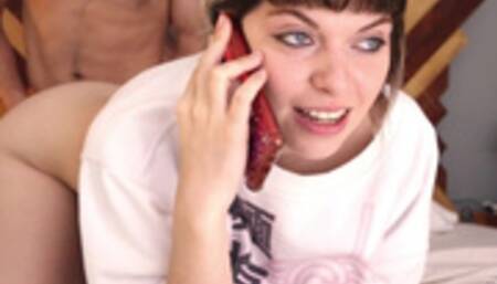 Face to camera trying to hide she is being fucked with her girlfriend on the phone