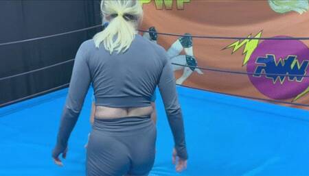 Blonde fem wrestler wrestles competitively