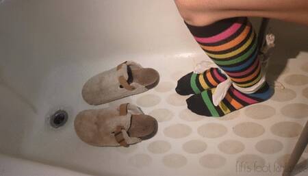 Fifi in ankle socks tied to a stool in the bathtub with cold water rising *new*
